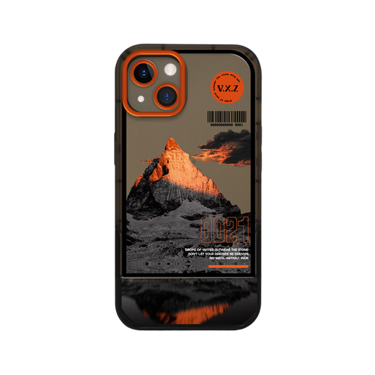 a phone case with a mountain in the background